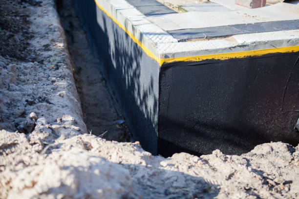 Professional Exterior Waterproofing technician working in Lynchburg, OH